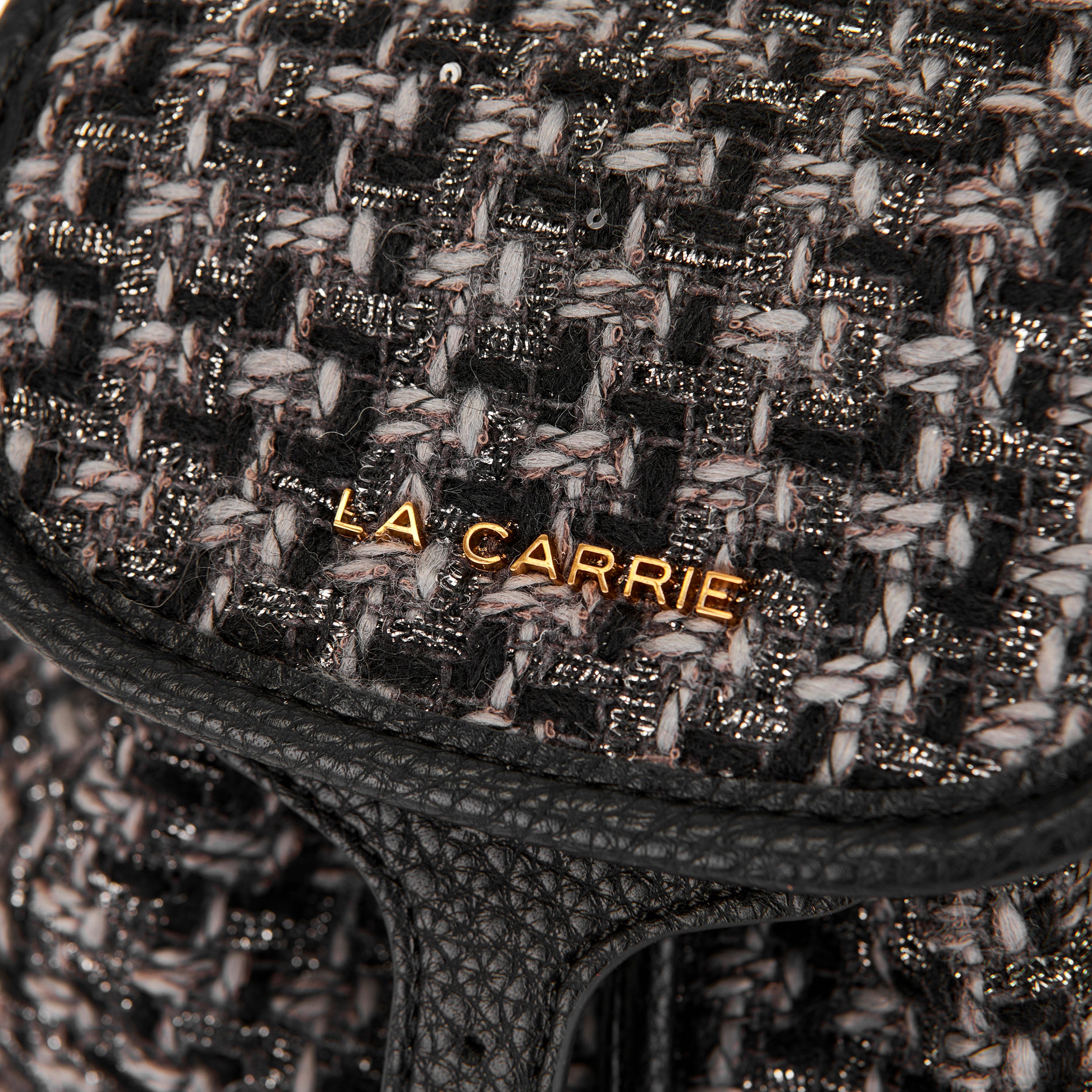 La Carrie Cross sac à dos noir bouclé 27x31 cm