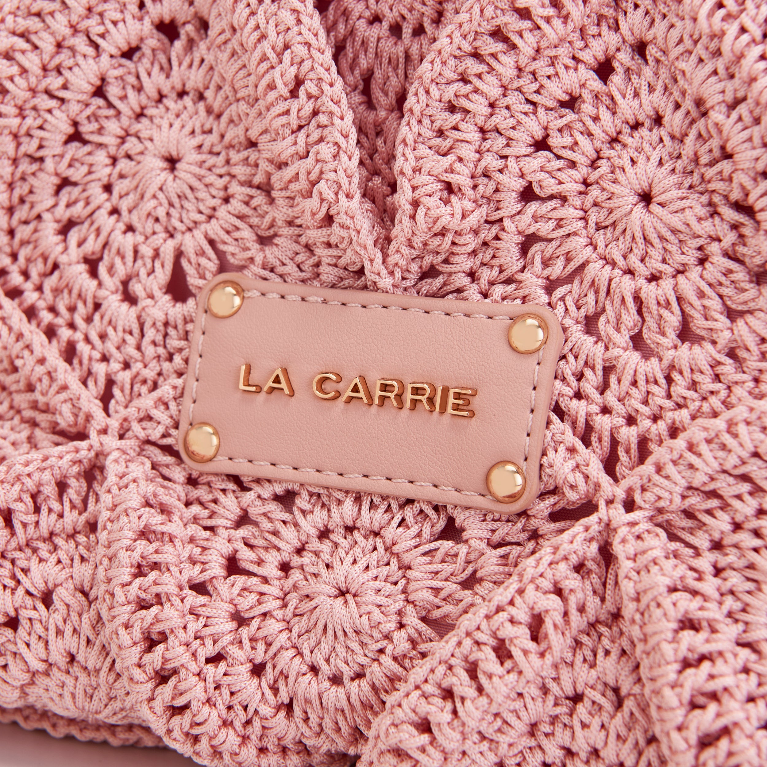La Carrie Cross Road sac à main rose crochet brodé