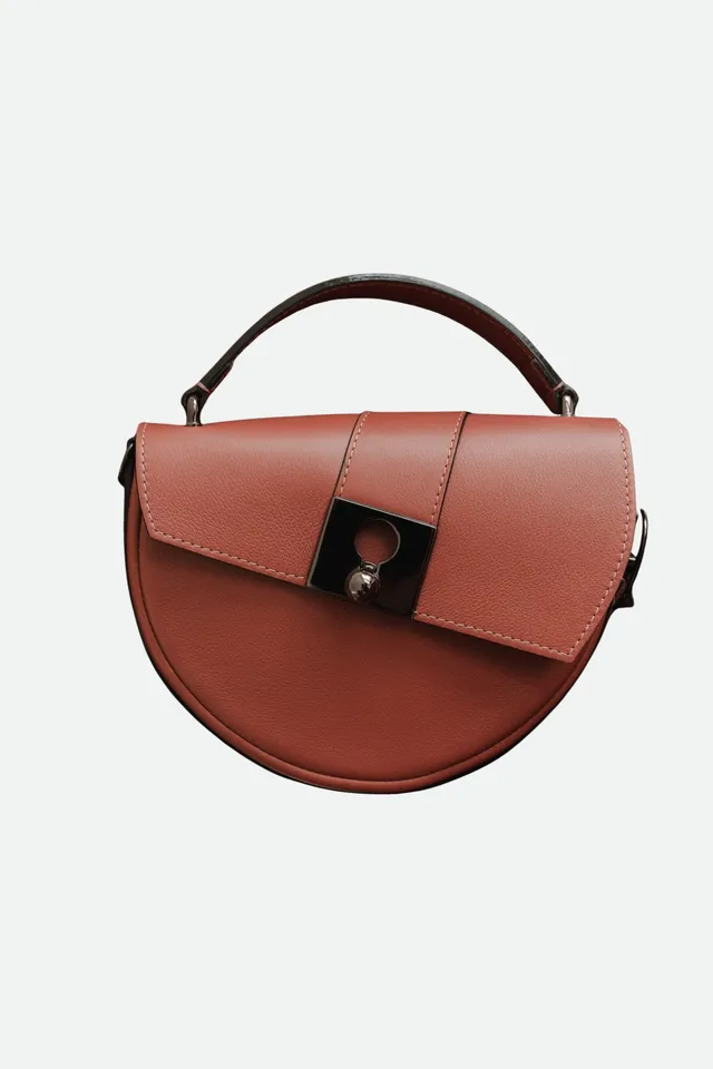 Nodie's Côme sac demi-lune cuir vieux rose grainé
