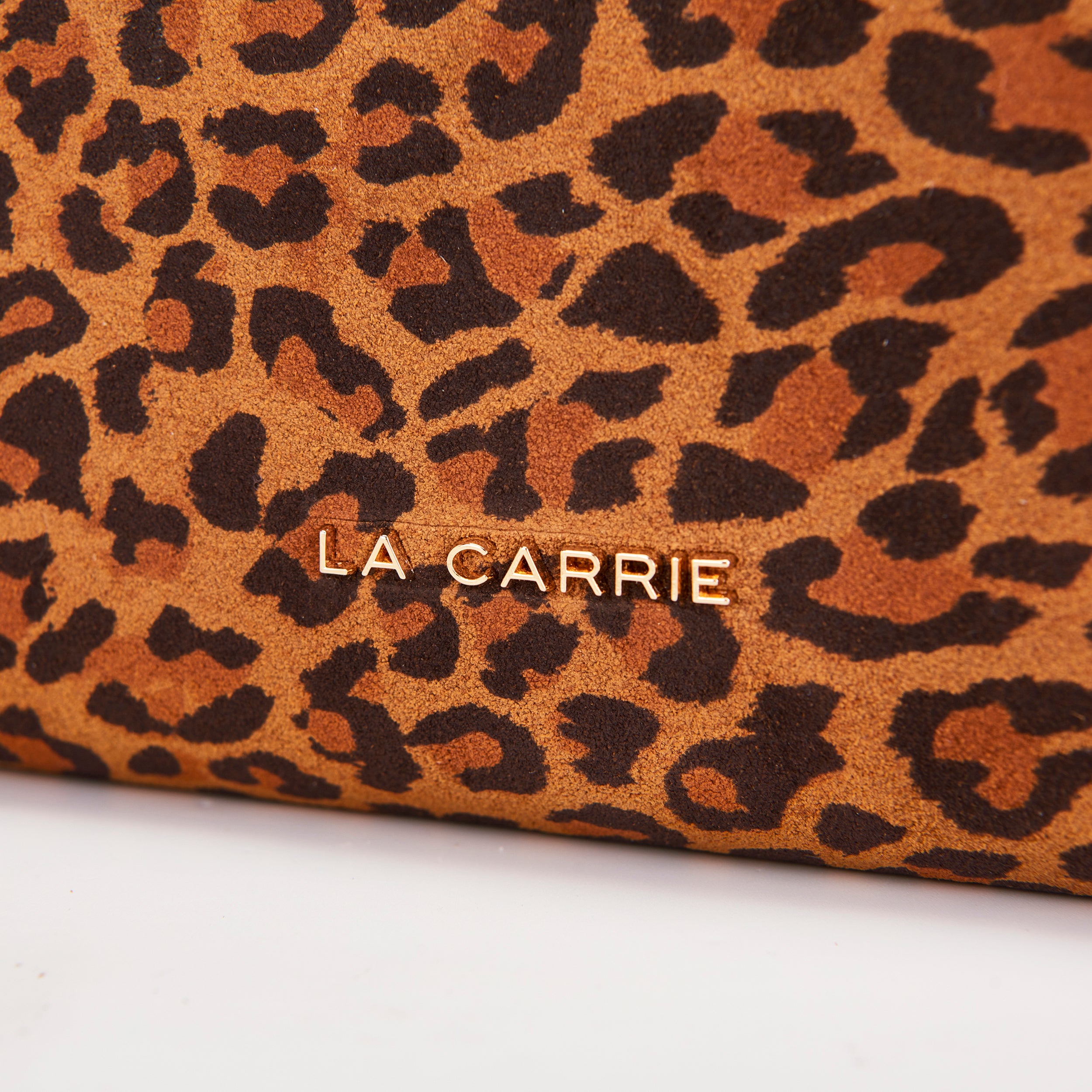 La Carrie Lio portefeuille zip marron léopard
