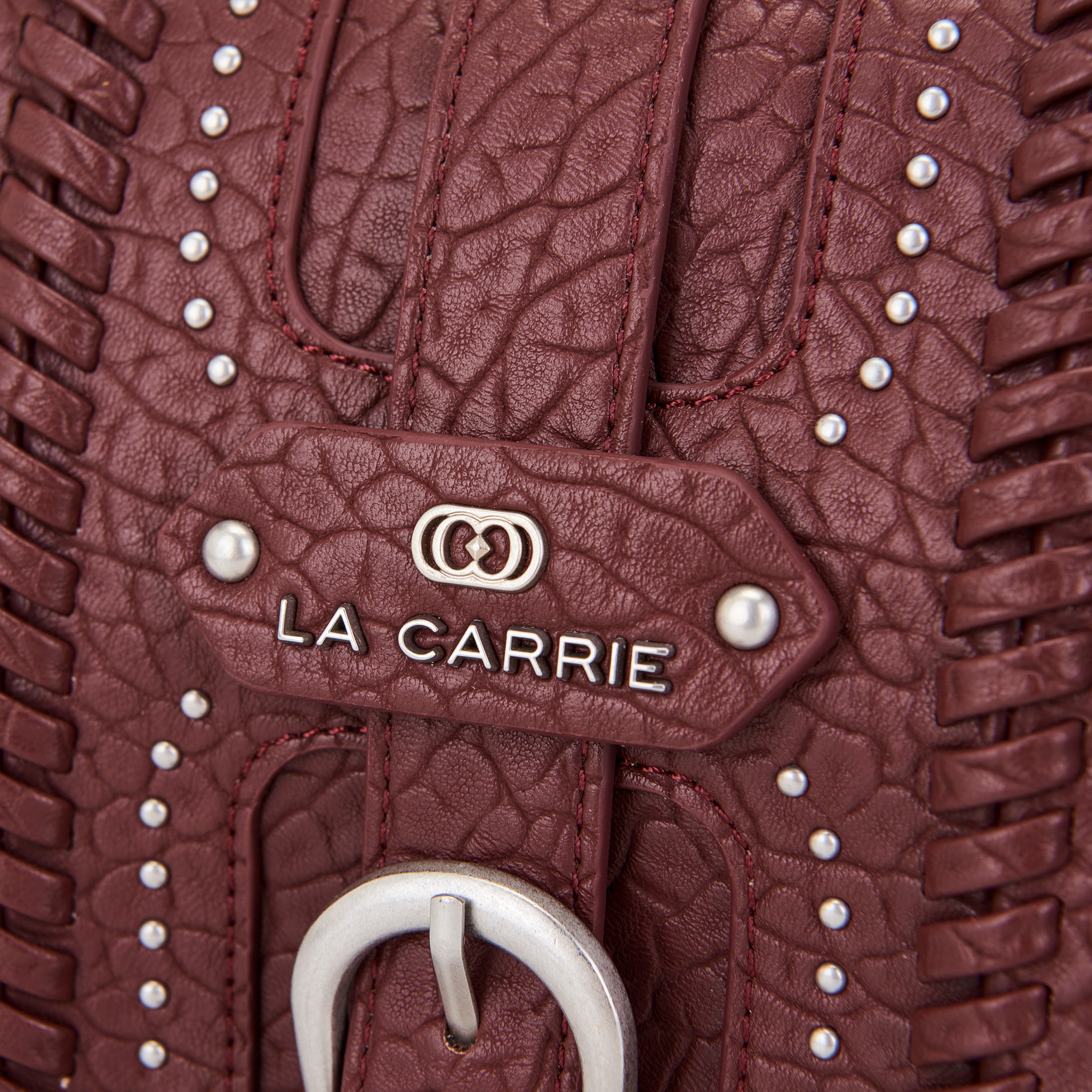 La Carrie Isabel Moterrey sac bandoulière bordeaux clouté